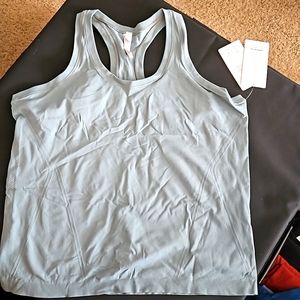 Athleta tank.  Sea green size 1x. Fitted tank